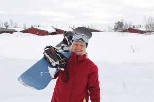 Kvinna med snowboard